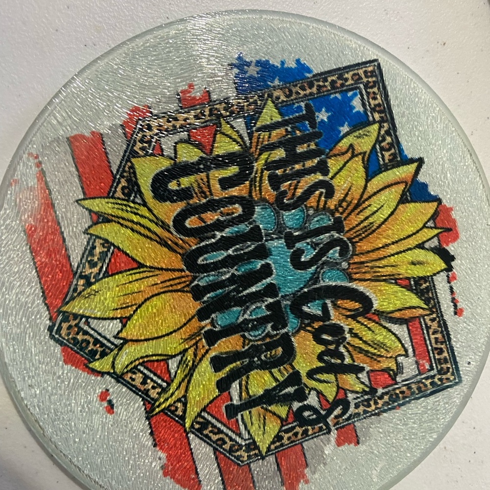 8” round cutting board.  Hand crafted sublimation